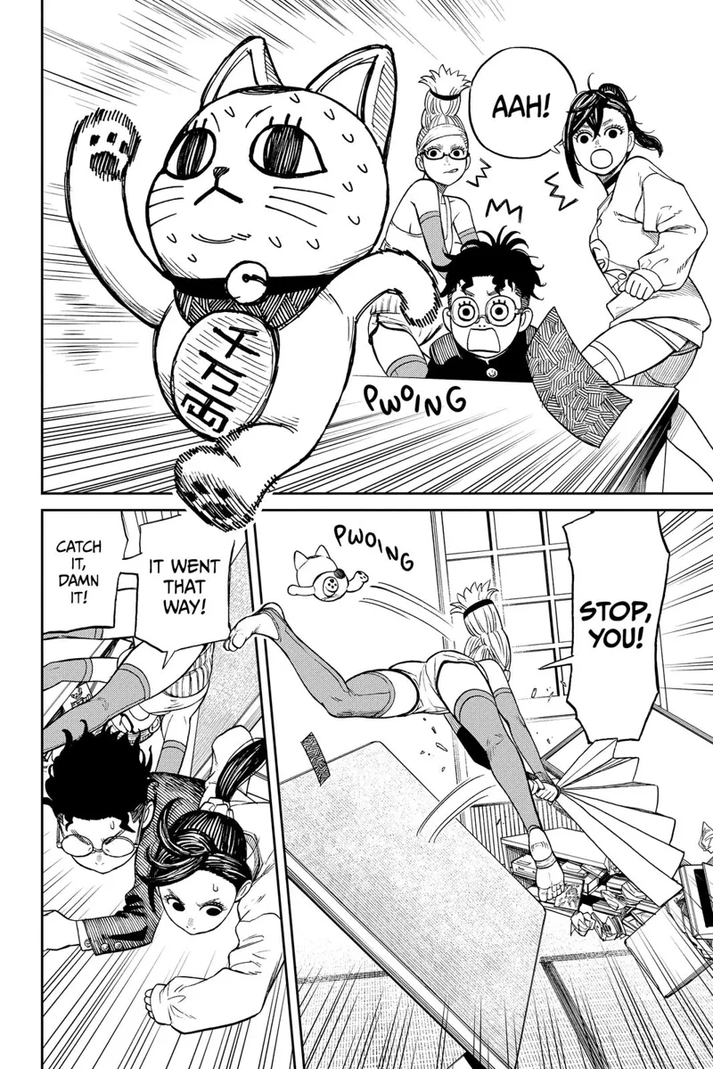 Suddenly, the doll kitten runs away. Grandma tries to smack it but misses. Momo and Okarun chase the doll.