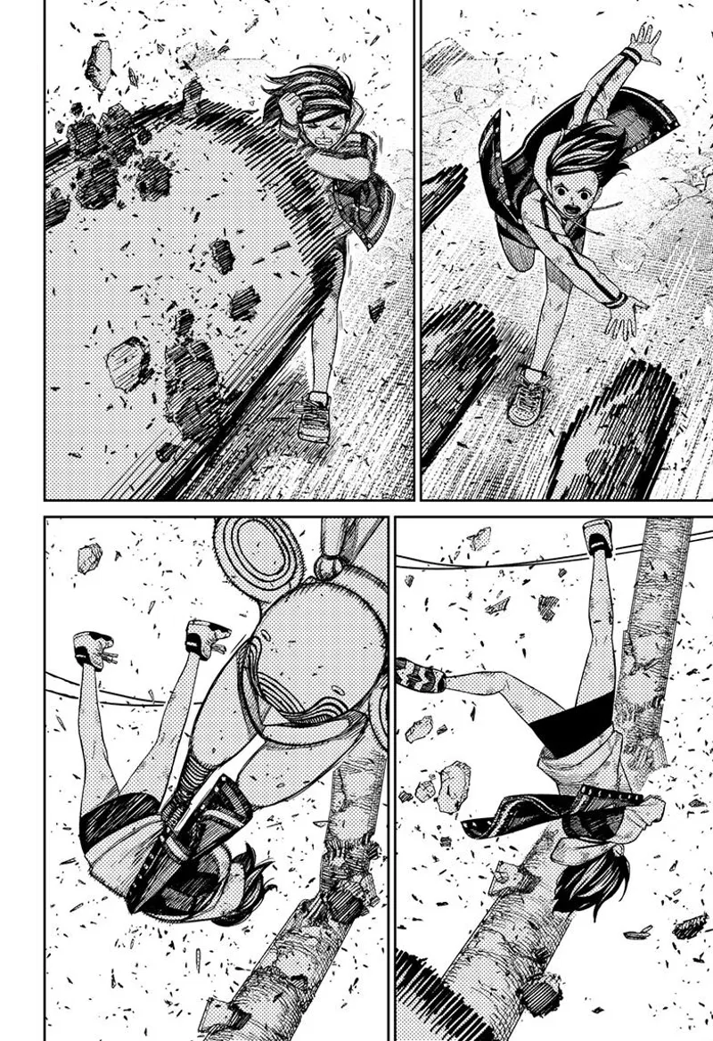 Momo gets hit by the alien's attack. She is smashed into a pole.