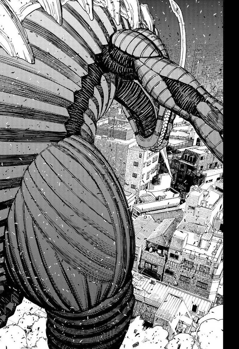 The Kaiju suddenly grows big and towers over the buildings.