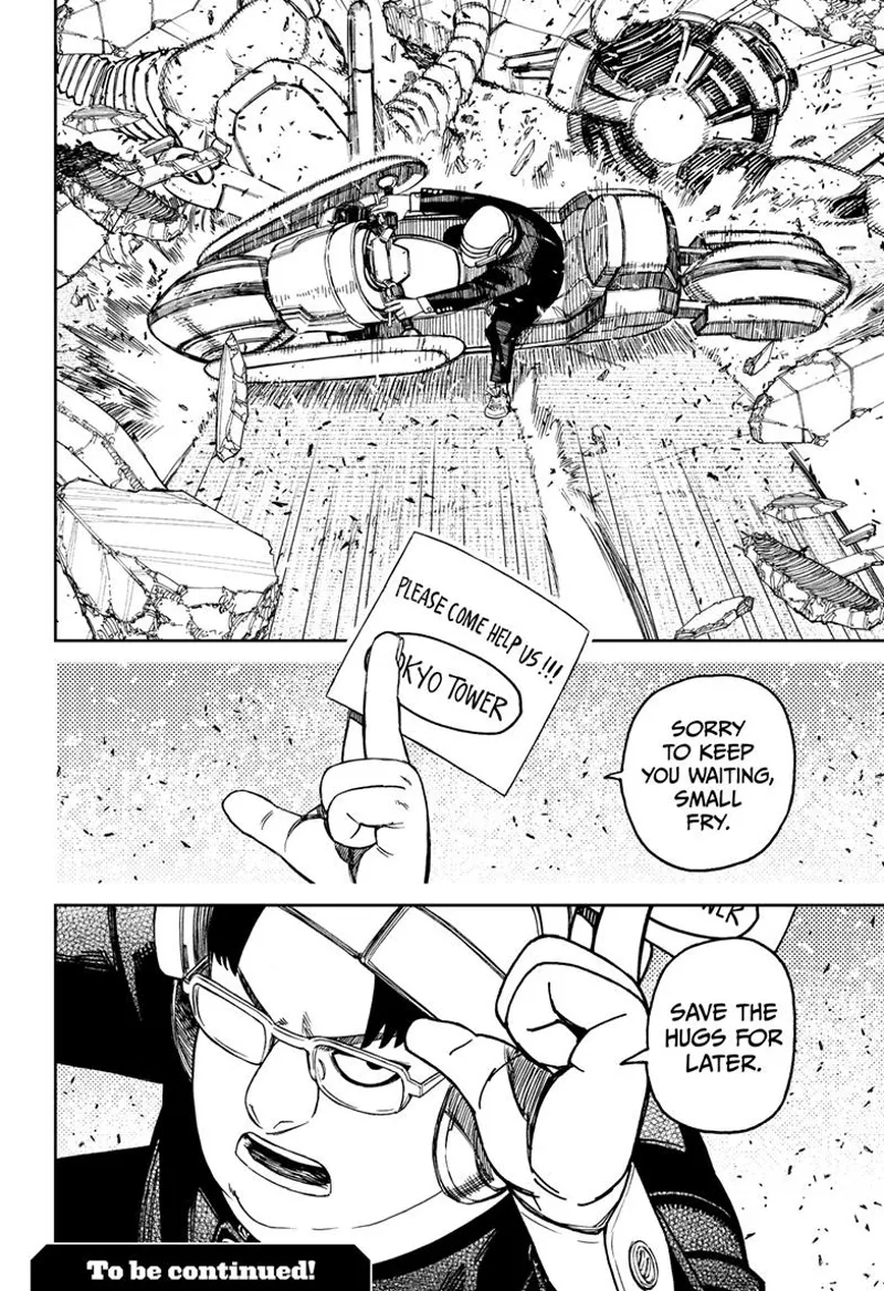 Kinta raises his mask and takes out a note after stopping his bike.