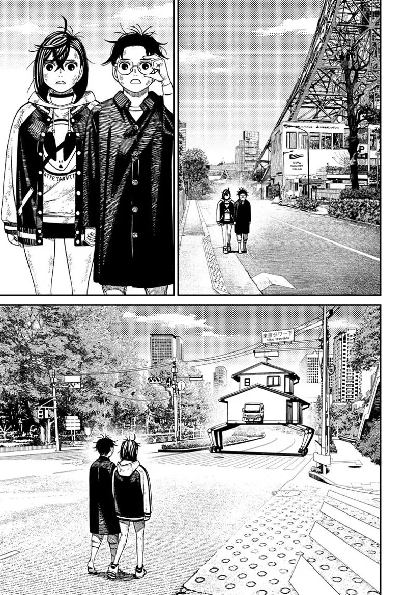 Momo and Okarun walk along the street and see Grandma's house vehicle.