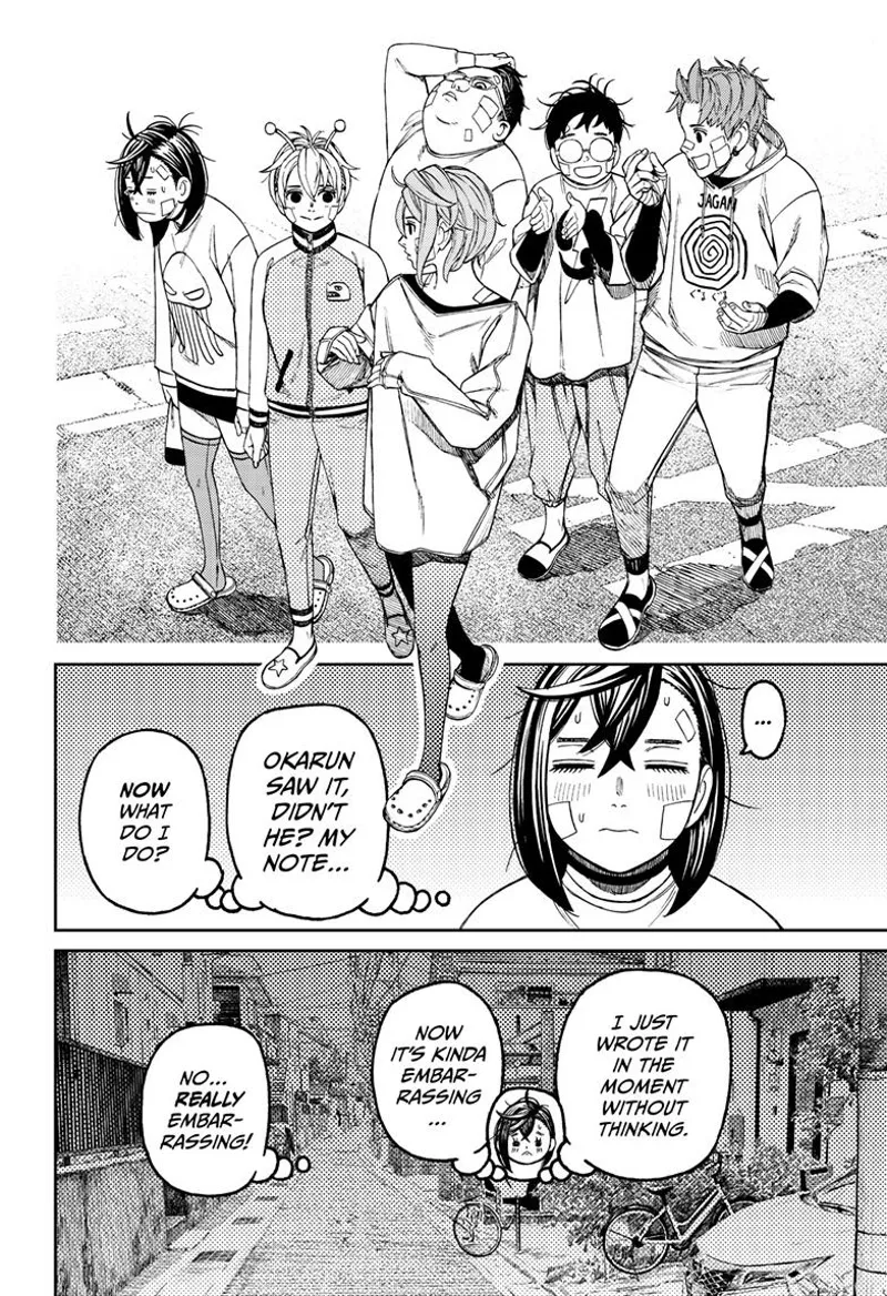 They keep talking while walking. Momo makes an embarrassed face after recalling the note she left for Okarun.