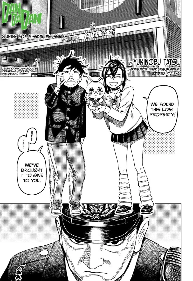 Momo and Okarun smile as they bring a lost toy cat property to the police box. The officer looks serious.