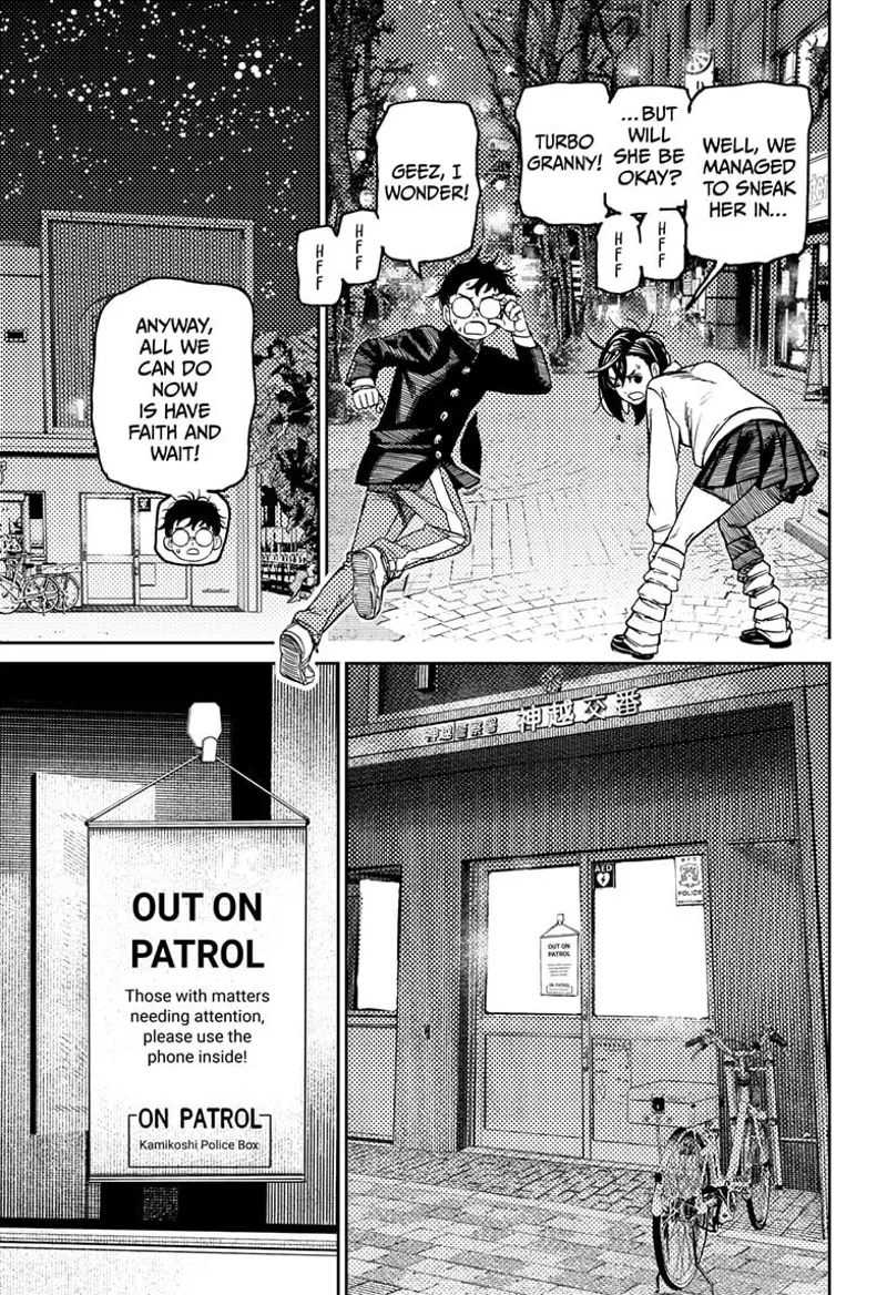 Momo and Okarun are panting. They look at the station and see a sign that the police on duty is on patrol.