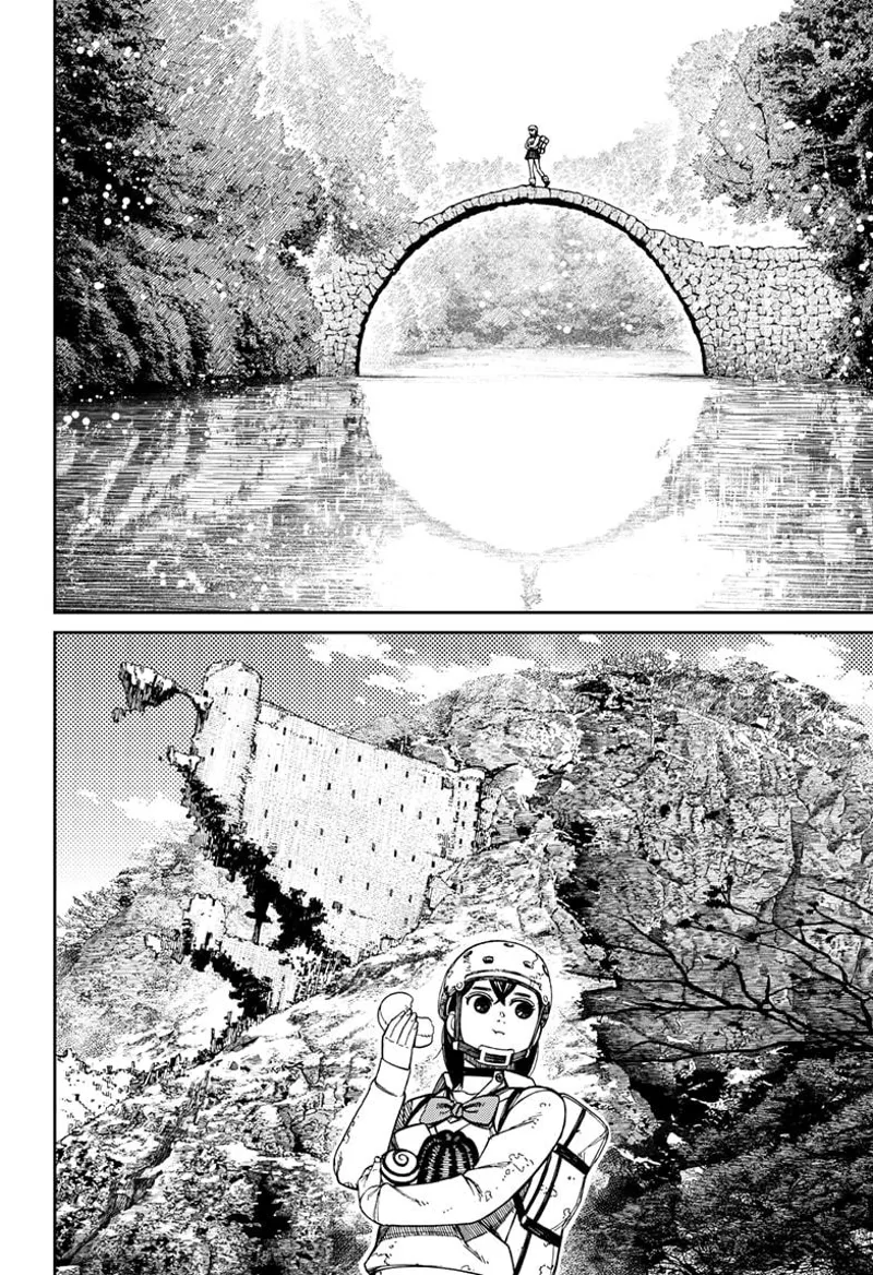 Momo walks over a stone bridge and passes a ruins while carrying and eating sweets.