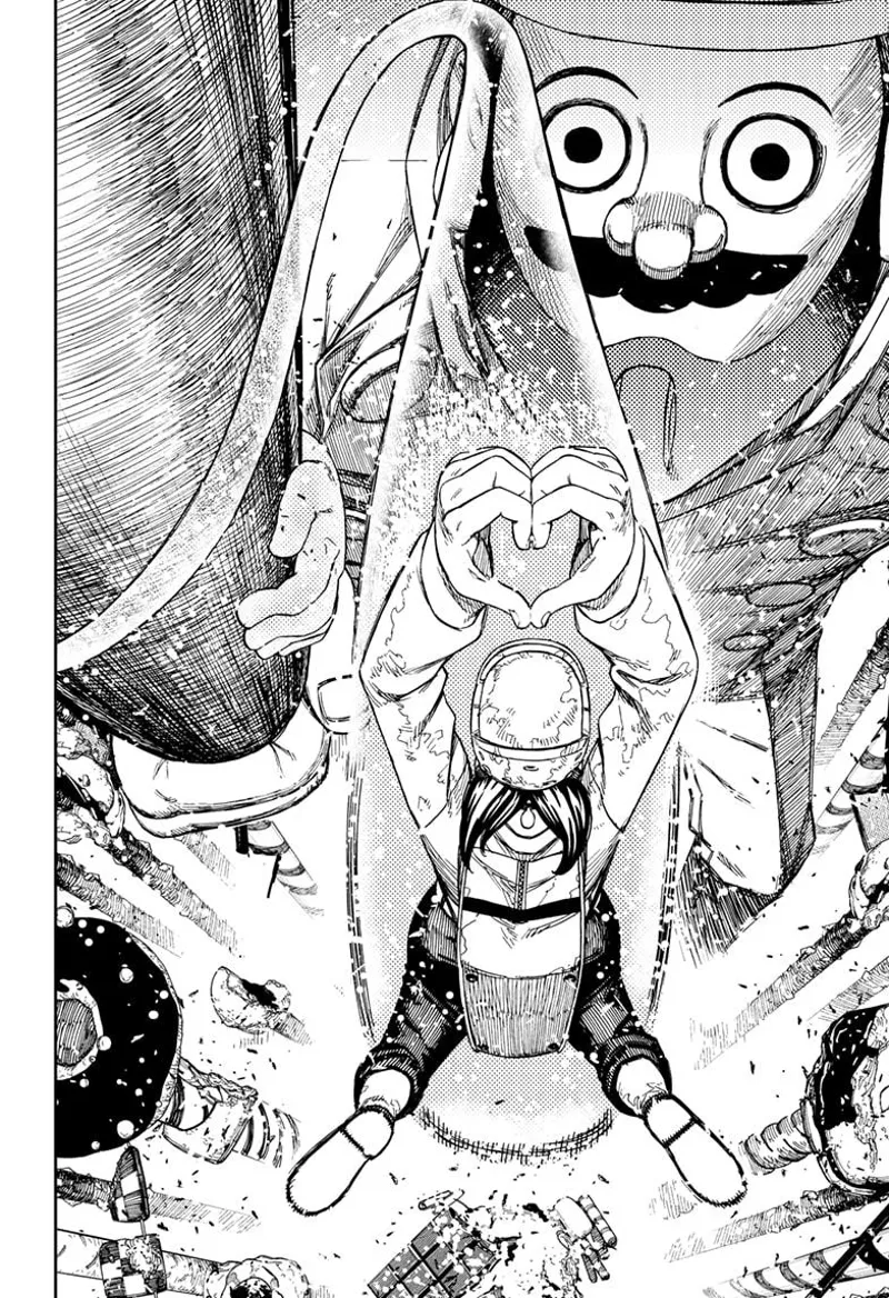 Momo jumps above the giant chef's face and prepares a Moe Moe attack.