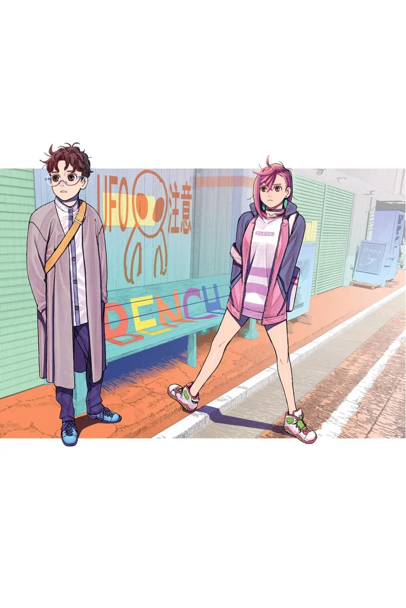 A colored image of Aira and Okarun standing near the bench with an alien logo painted on the wall.