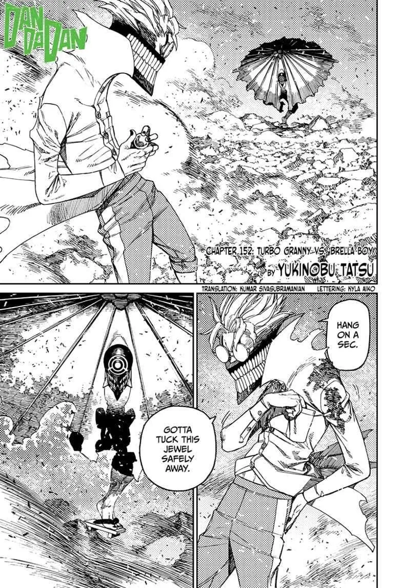 Cursed Okarun holds his second nut and tucks it away safely. 'Brella Boy, aka cursed Zuma, stands on one foot.