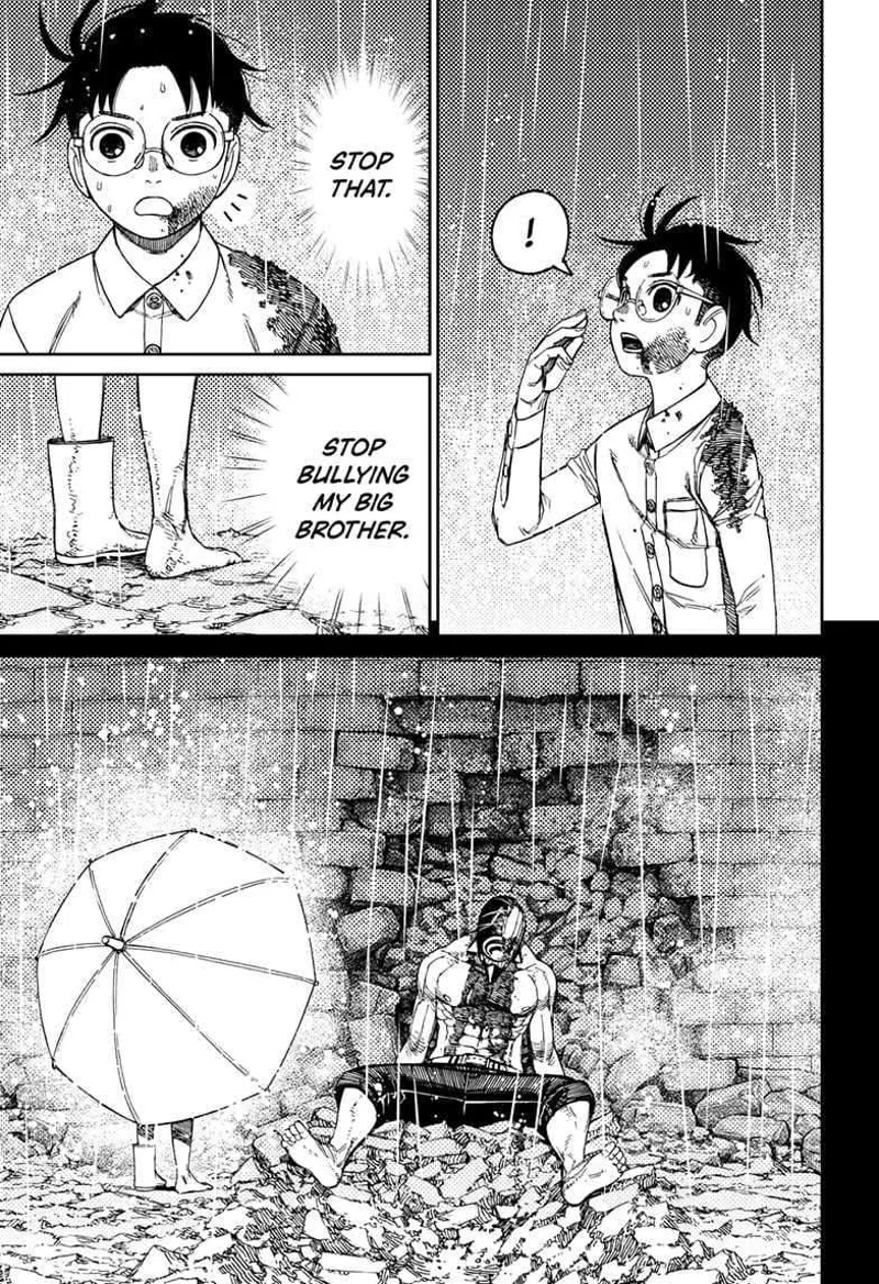 Okarun notices the rain and sees a kid behind an umbrella.