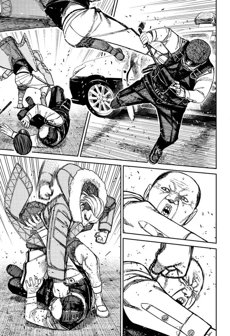 The cop gets hit by a flying kick and gets punched in the face.