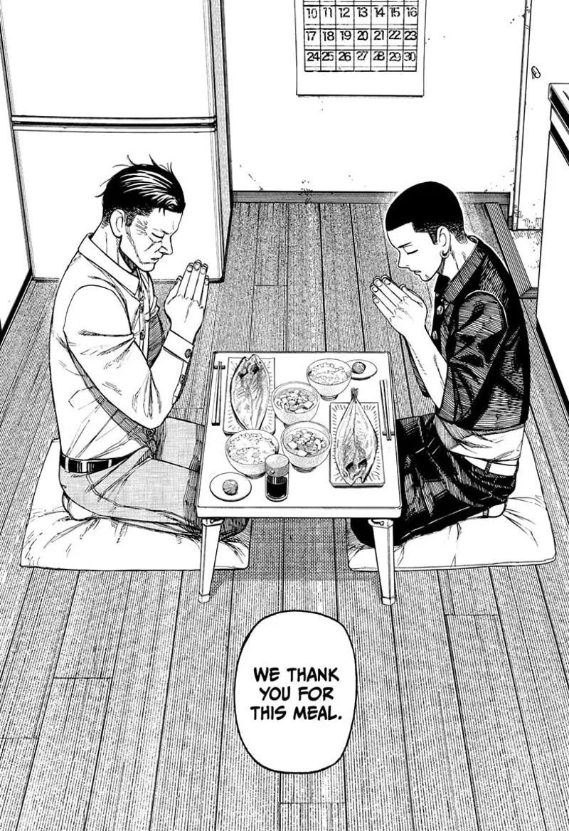 Unji and Bega are at the table praying before their meals.