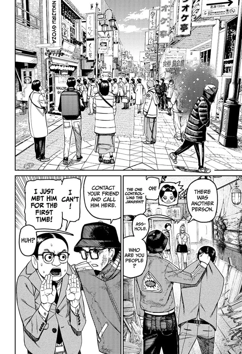 People are outside the street in front of Nikujiru Gyoza. Seiko comes back inside and tells the guy to call the orchestrator.