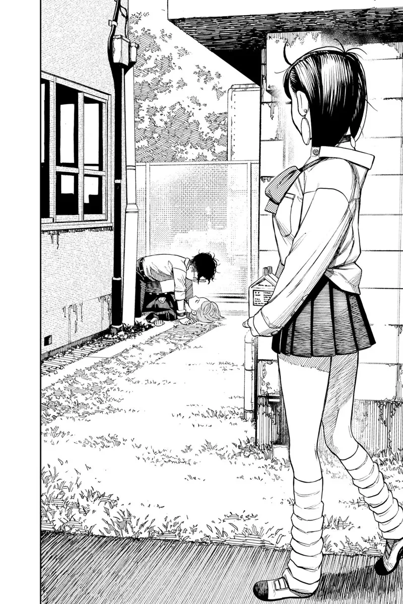 Momo looks at a corner and sees Okarun going on top of Aira, who is lying down.