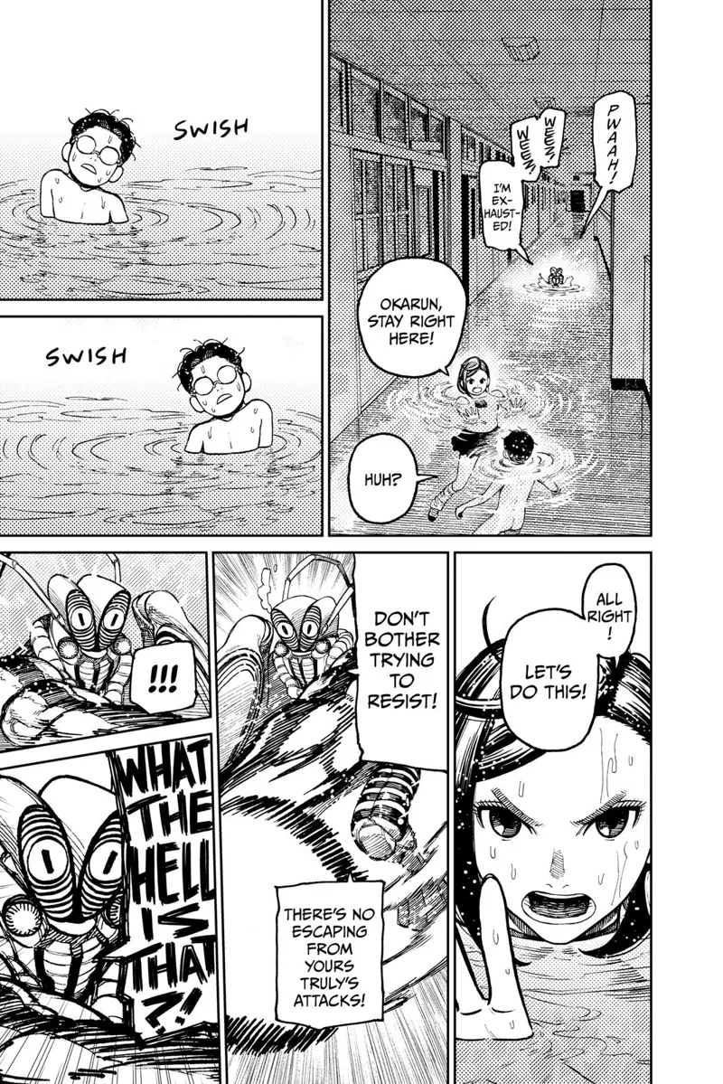 Momo uses her powers to control Okarun's movements. The mantis shrimp monster attacks but is suddenly shocked.