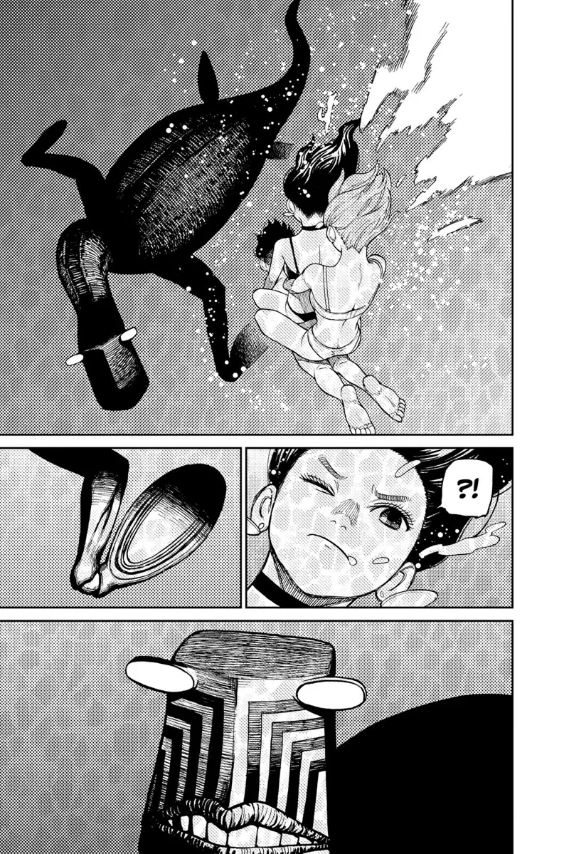 Momo and Aira dive underwater while riding Okarun. They approach Nessie.