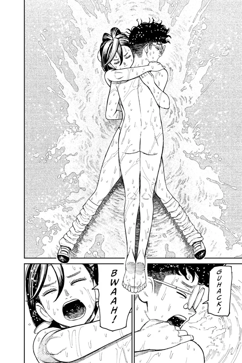 Momo lies on a wet surface while hugging Okarun, who is on top of her. They both grasp for air.