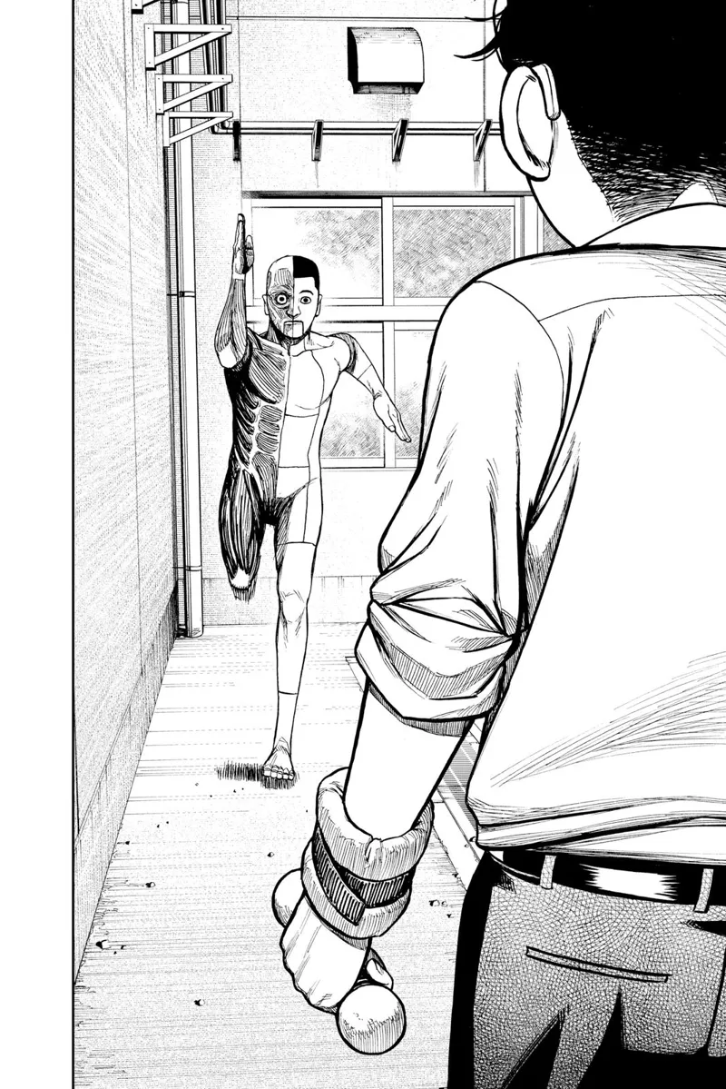 Okarun sees a weird man, half his body without skin and showing muscles, running towards him.