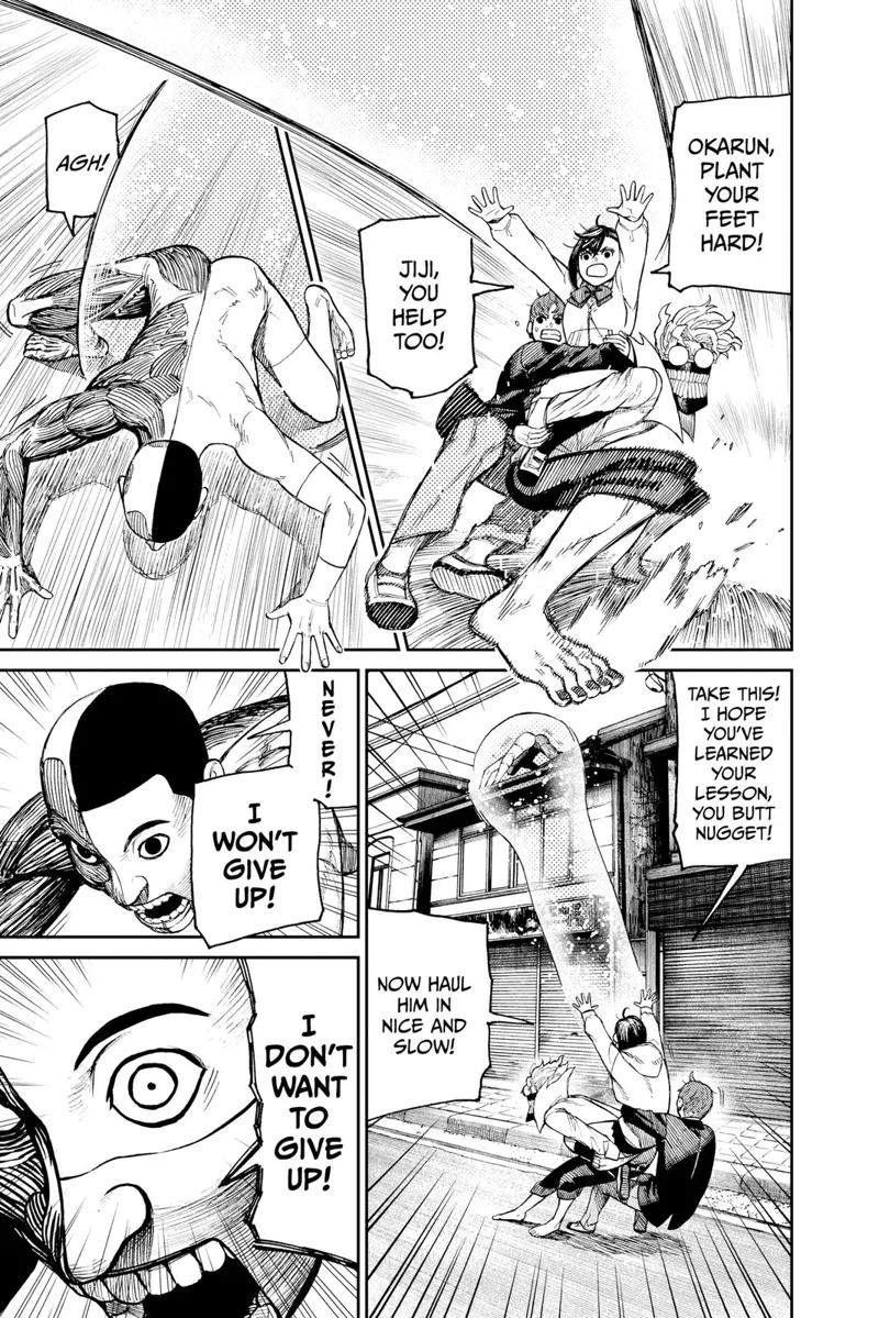 Okarun firmly holds the naked weird guy as Okarun stops running to seize the guy.