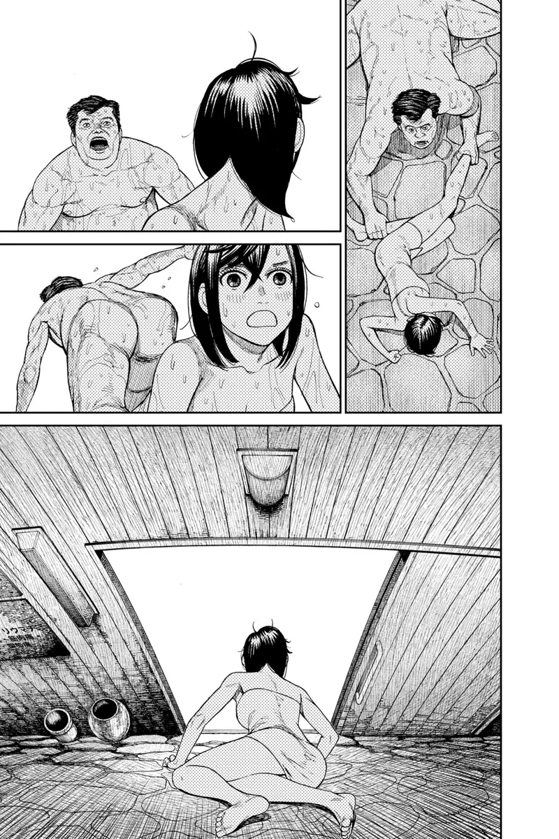 The man grabs Momo's other foot but runs away as a wall falls on him, saving Momo.
