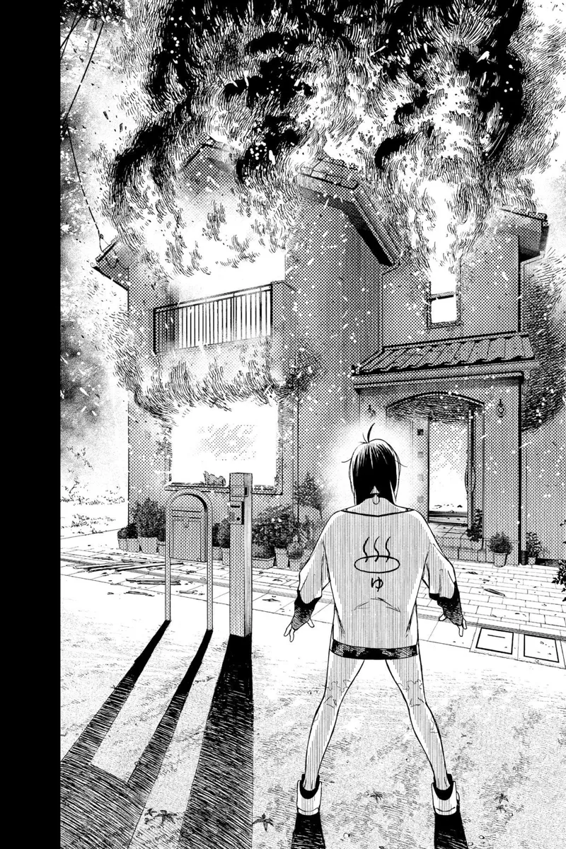 Momo is on the street, watching the house ablaze.