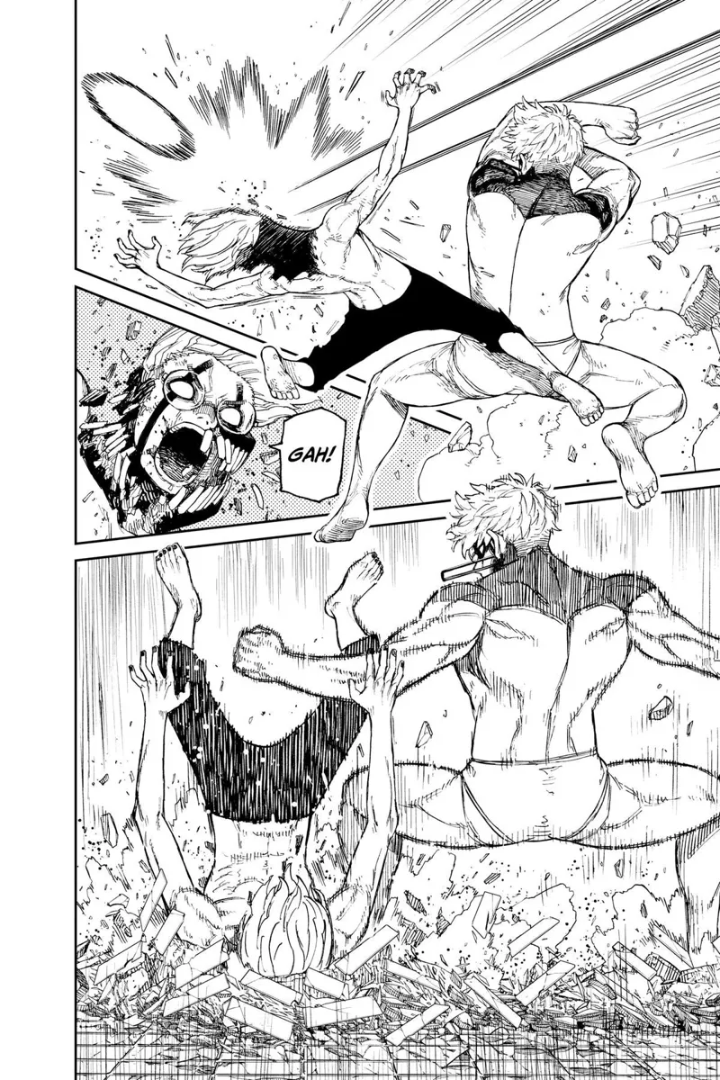 Okarun gets hit by the energy ball in the head, and Jiji punches him to the ground.