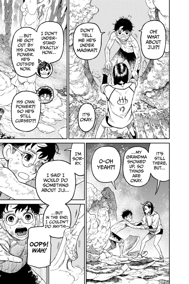 Momo holds Okarun's hands as he gets out of the hardened goo.