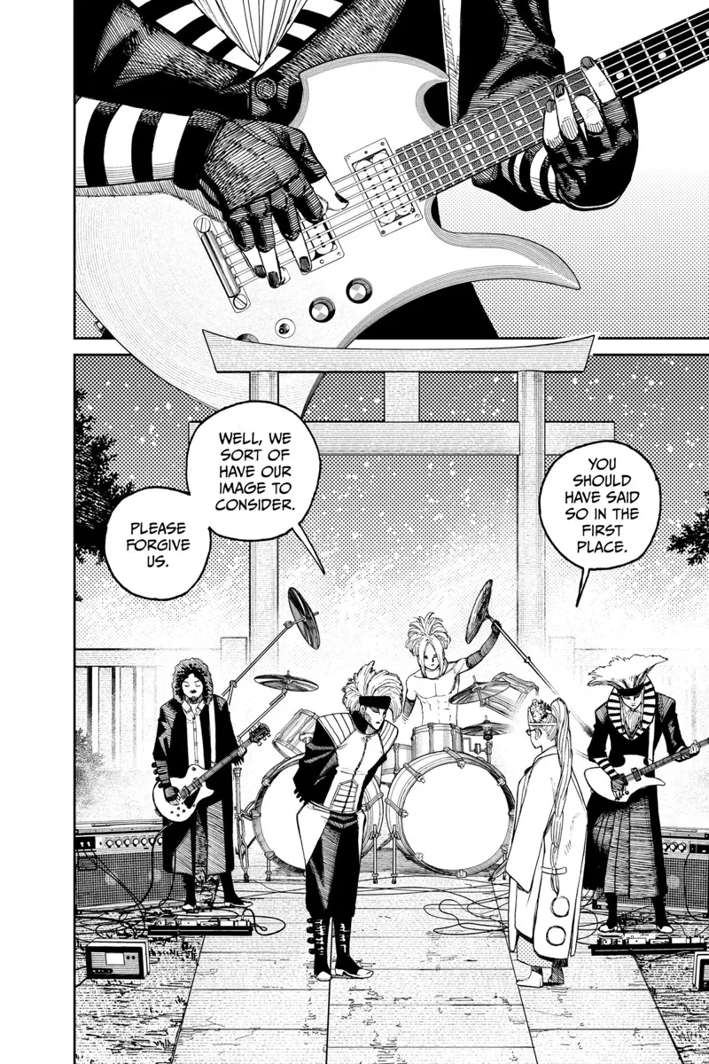 The Hayashi Performers take out their drums, guitar, and bass guitar instruments. They look like a goth band.