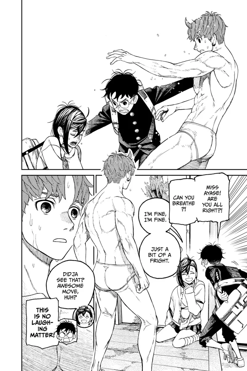 Okarun pushes Jiji away and tends to Momo. Jiji watches them.