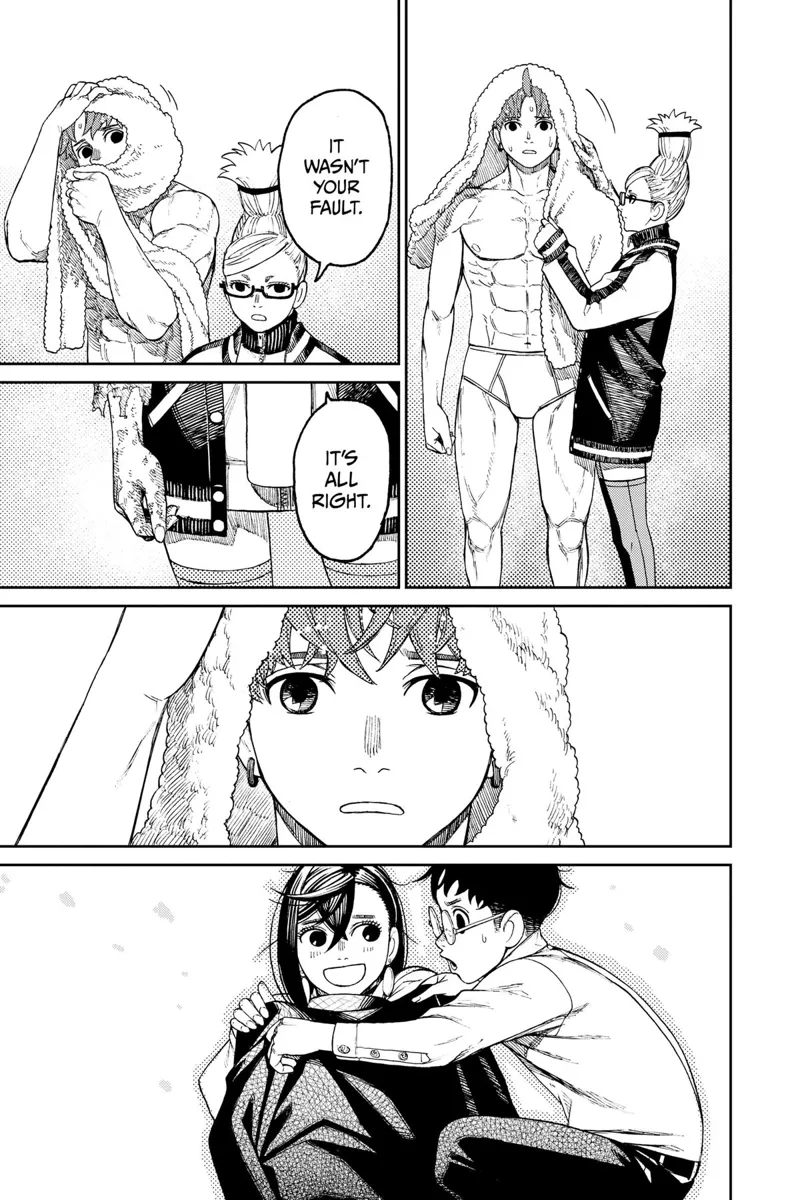 Grandma wraps a towel around Jiji who is staring at Momo and Okarun.