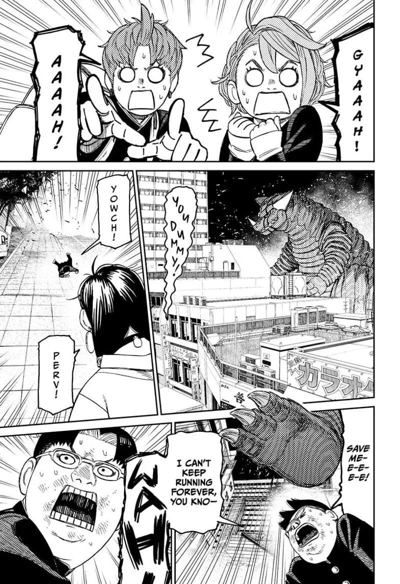 Jiji and Aira are shocked after seeing the huge Kaiju. The pervy classmate trips, and the Kaiju is about to stomp him.