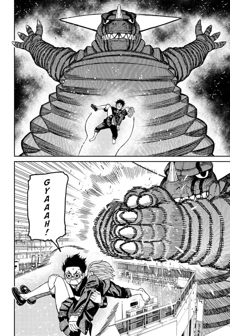 The giant Kaiju appears behind and smacks them but misses.