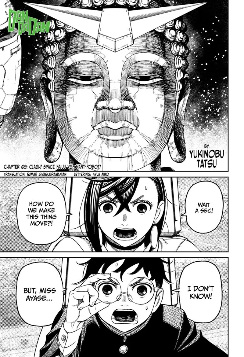 Momo asks how to make the giant Buddha robot move. Okarun calls her attention.