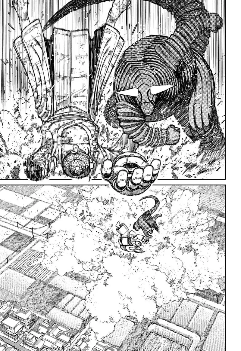 The giant Kaiju punches the Buddha to the ground.