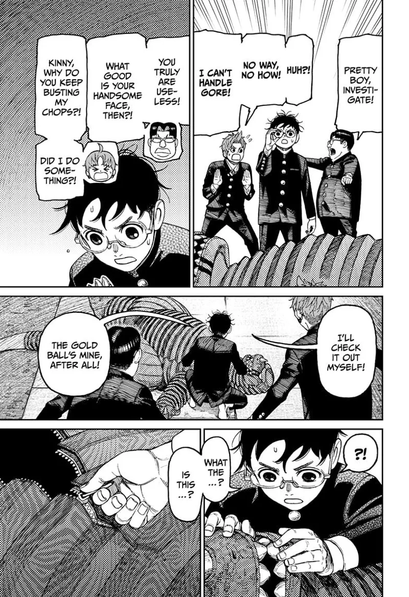 Okarun investigates back at the monster. He discovers a zipper and pulls it down.