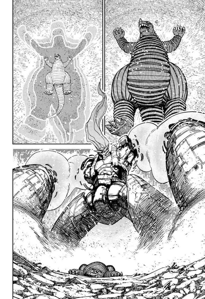 The Kaiju shrinks in front of the enormous robot.