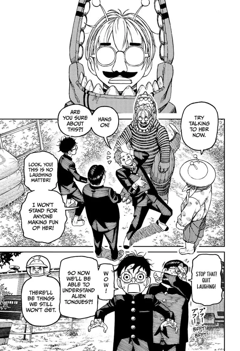 Jiji laughs after seeing the alien woman wearing a funny costume as part of the translator device.