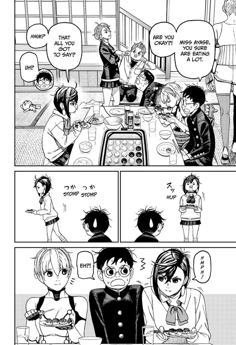 The gang is eating merrily. Momo stands up and transfers beside Okarun.