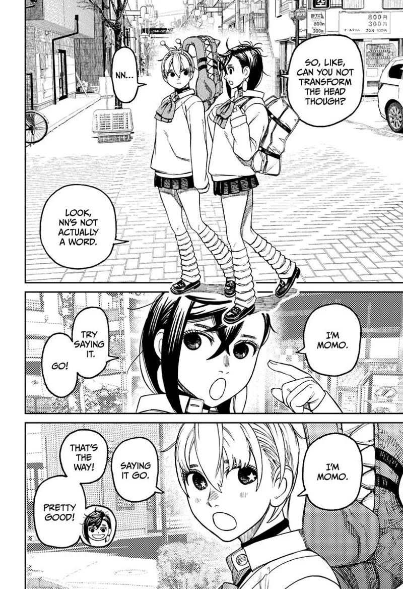 Momo gives lessons to Vamola as they walk to school. Vamola brings the Kaiju head mask.