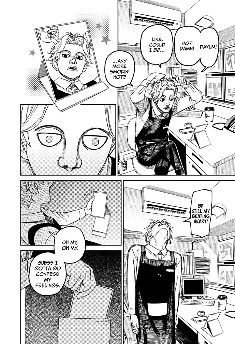 A man fixes his hair as he stands and looks at his mirror.