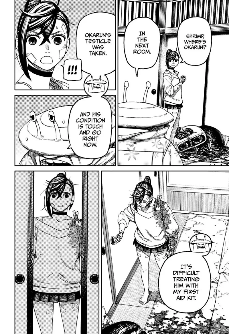 Momo stands holding the ball and opens the door to the next room to find Okarun.