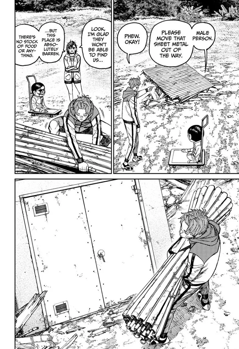 Jiji removes a sheet of metal that reveals a door behind it.